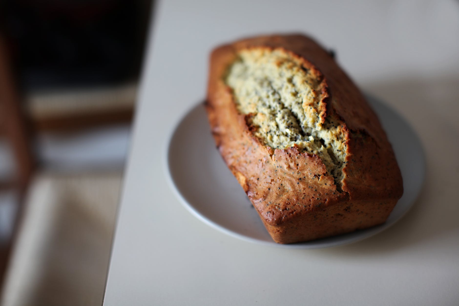 close up photography of banana bread on saucer