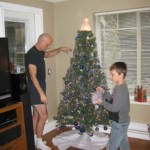 Tree decorating nearly complete.