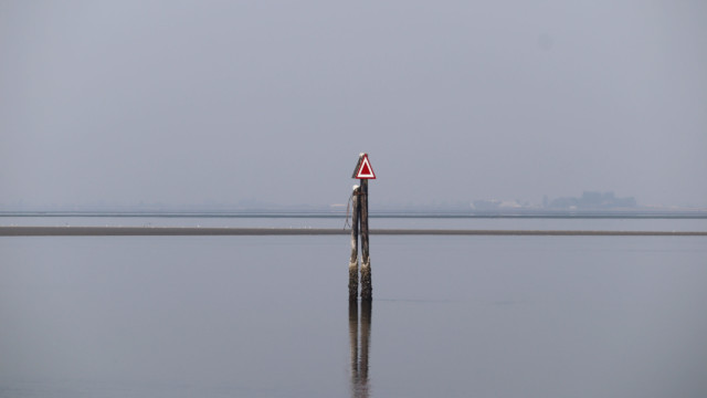 Warning on a calm sea. Warning on a calm sea.