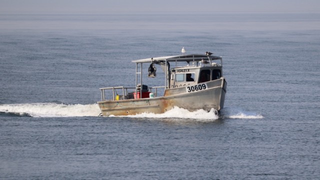 Boat plying the water off Crescent Beach. Boat plying the water off Crescent Beach.