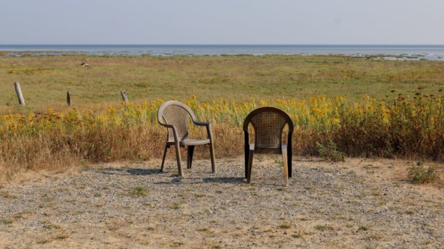 Chairs with a view. Chairs, with a black and white view.