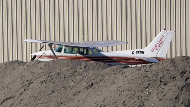 Plane and dirt, Pitt Meadows Regional Airport.