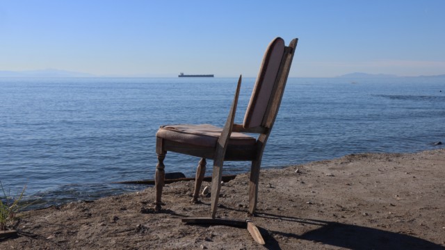 Broken chair on the northern jetty of Iona Beach Broken chair on the northern jetty of Iona Beach