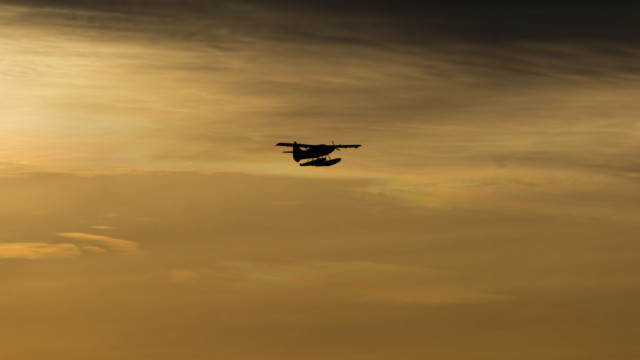 Seaplane against a golden sky Seaplane against a golden sky