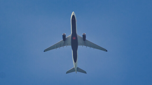 Another Air Canada jet passing overhead.