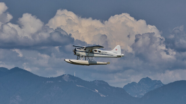 Seaplane at Terra Nova, coastal mountains in the background.