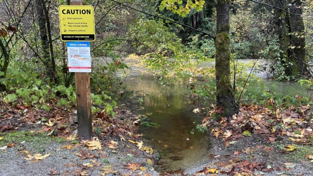 Impassable trail as river water edges closer to the main trail.