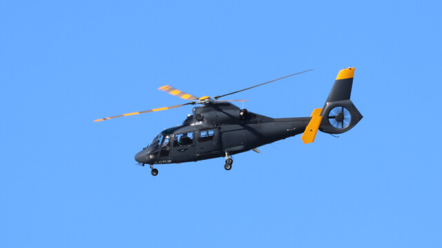 A helicopter helicoptering over Terra Nova.